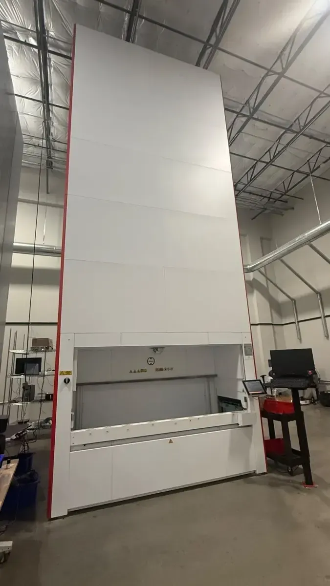Ferretto VLM-3000 vertical lift module, front view with access opening and operator station
