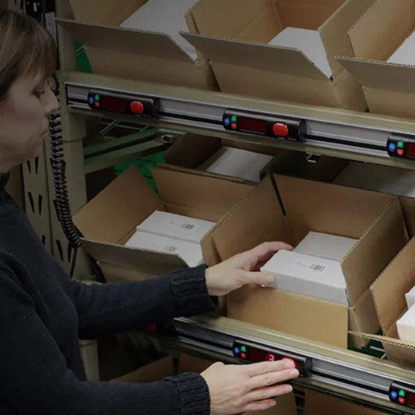 Pick-to-light shelving guiding operators to the correct bins